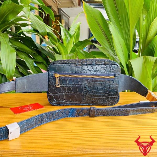 Ảnh túi đeo bụng da cá sấu TTL06 xanh navy, nhấn mạnh thời trang, cao cấp, bền bỉ, sang trọng và bảo vệ.