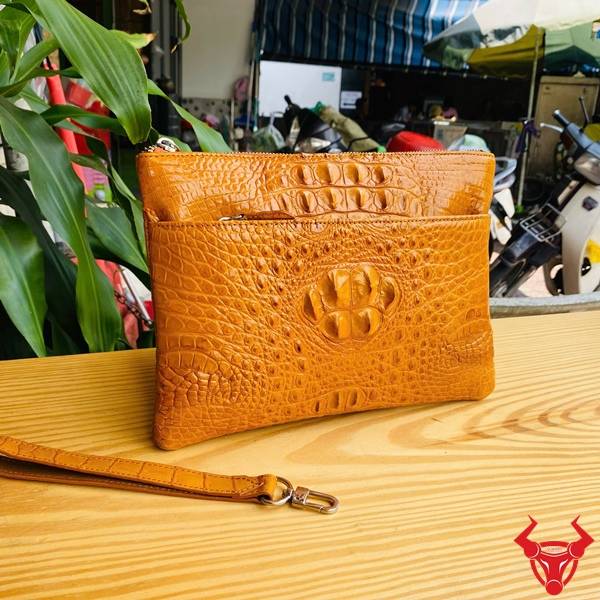 Clutch Cầm Tay Da Gù Cá Sấu Nhiều Ngăn Màu Vàng Cam Tiện Dụng Túi clutch da gù cá sấu CBDA4 màu vàng cam dành cho doanh nhân hiện đại.