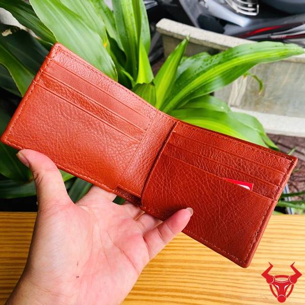 Ví Nam Da Gai Lưng Cá Sấu Mini VFA1 Màu Nâu Đỏ Nhỏ Gọn Ví nam mini da gai lưng cá sấu VFA1 màu nâu đỏ nổi bật với vân gai tự nhiên và thiết kế gọn gàng.